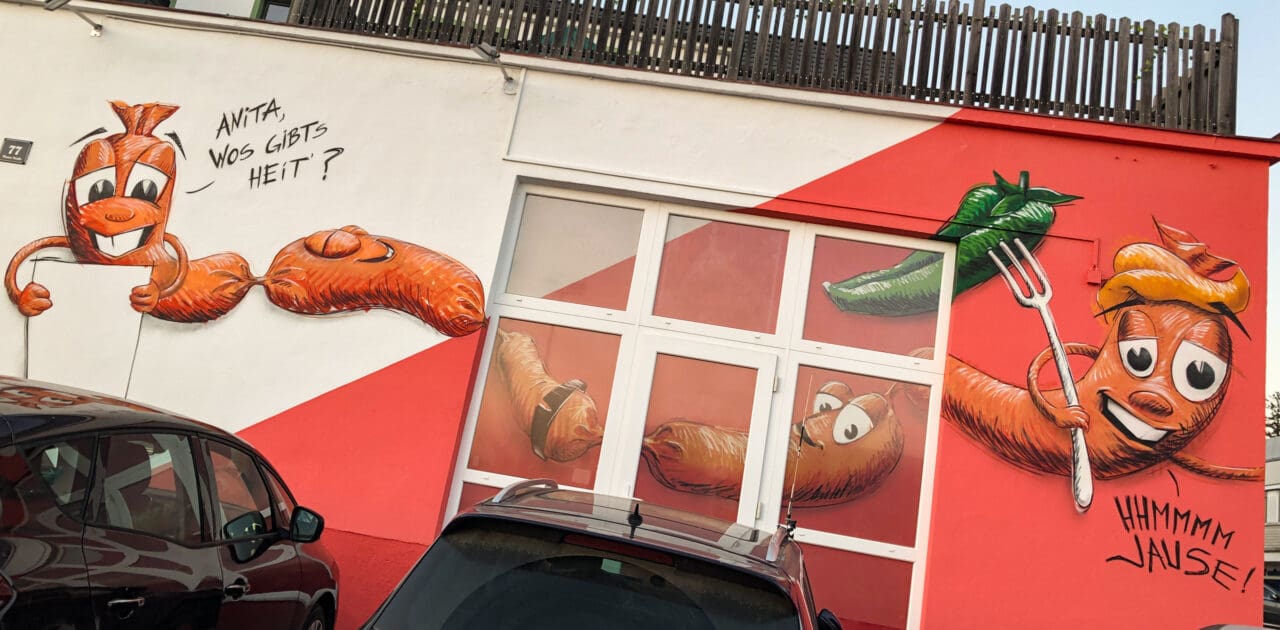 Colle GraffitiFassade mit Würstel